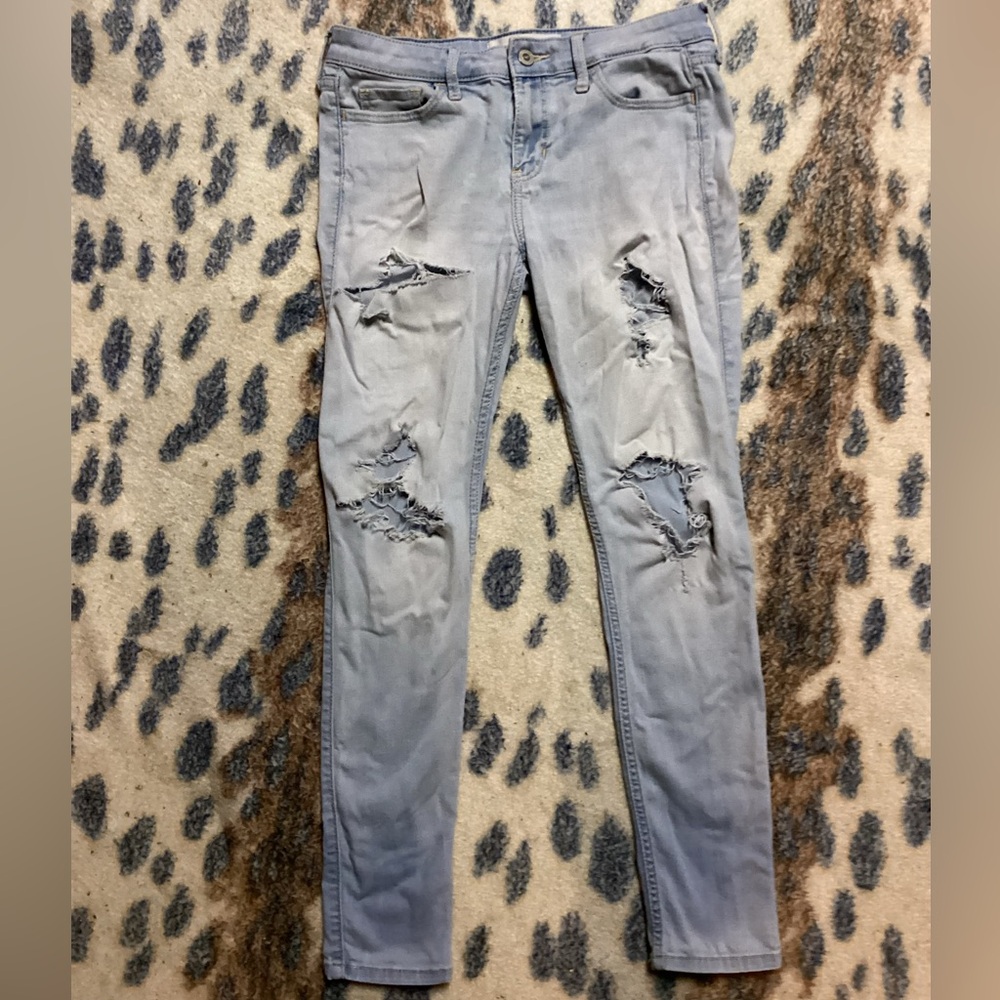HOLLISTER WOMENS LOW RISE SUPER SKINNY BLUE JEANS.